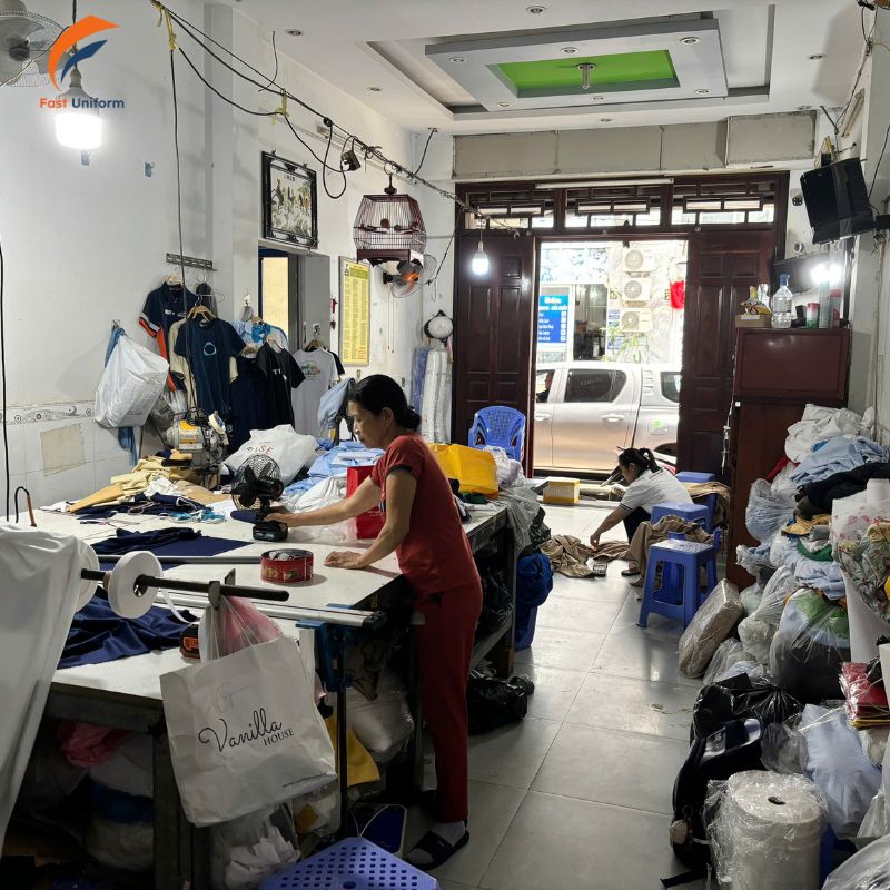 Quy trình may đồng phục vest nam xám đen