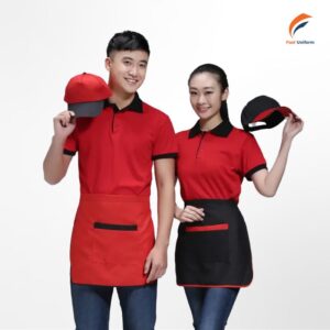 Đồng phục phục vụ đỏ phối đen nổi bật, thể hiện tinh thần chuyên nghiệp và sự gắn kết trong mỗi đội ngũ nhân viên
