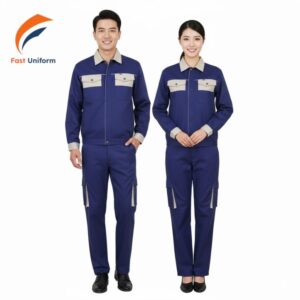 May đồng phục bảo hộ xanh dương đậm phối be chọn chất liệu vải phù hợp, đo size chuẩn và thử mẫu trước sản xuất