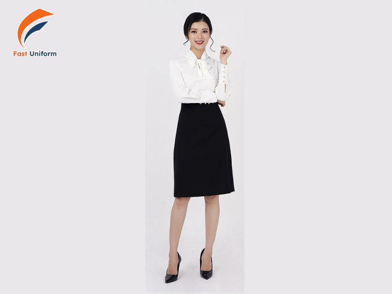Chân váy công sở dáng chữ A hoặc xếp ly, cạp cao tôn dáng, thoáng mát